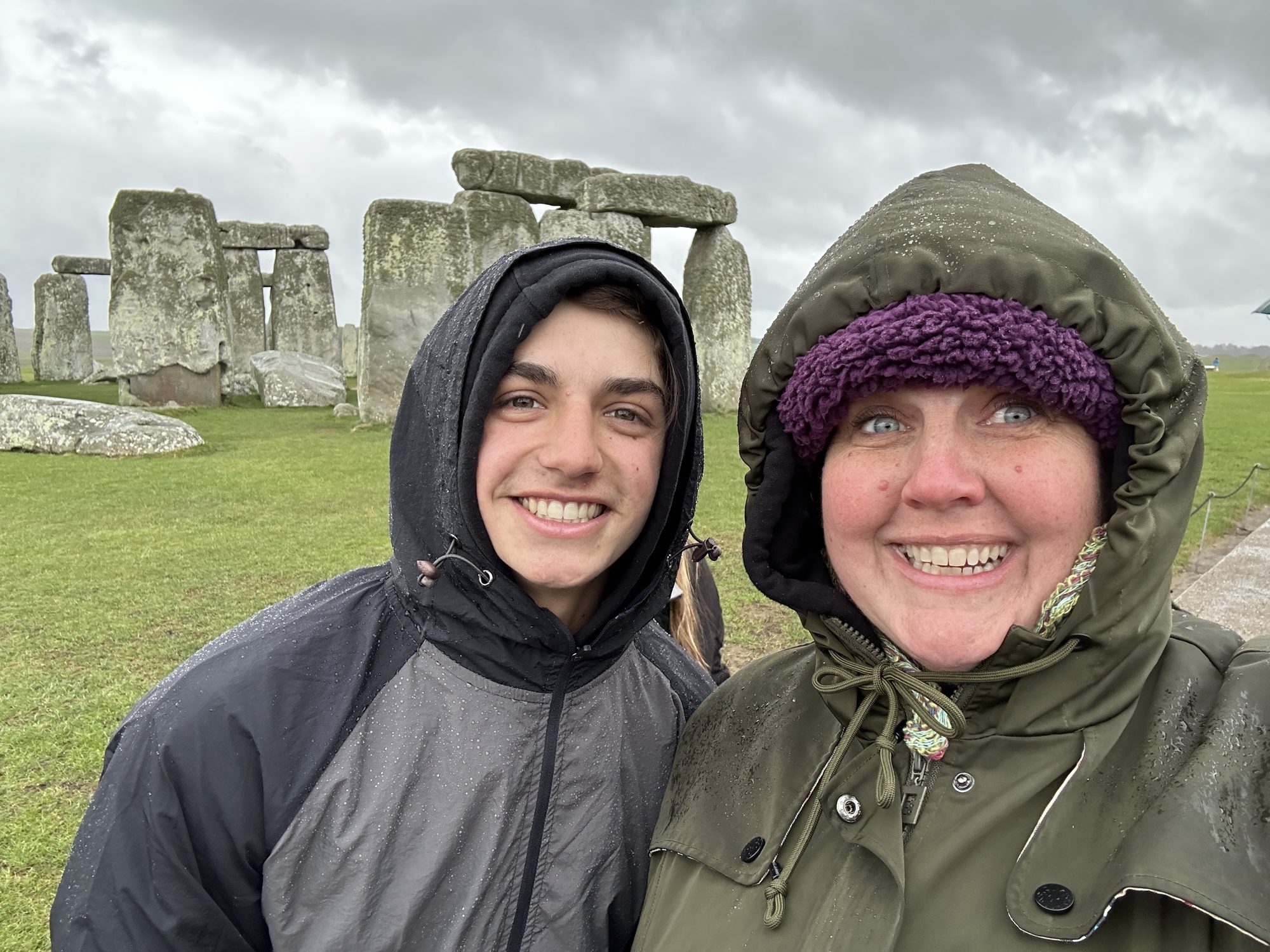 A GoXL trip leader and student at Stonehenge